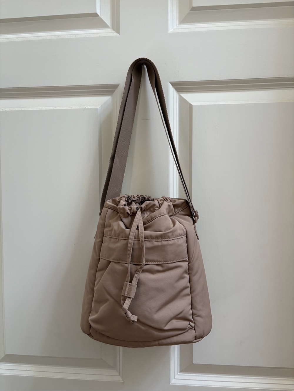 Uniqlo Taupe Drawstring Crossbody Bag